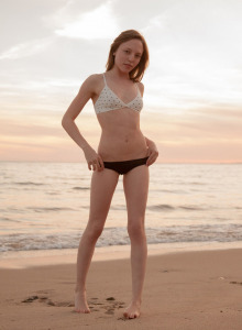 Amazing Audrey Star is at the beach in bikini in the evening