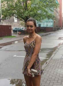 Exciting Slava Konevs is walking in the city in sexy summer dress flashing her perfect tits with puffy nipples